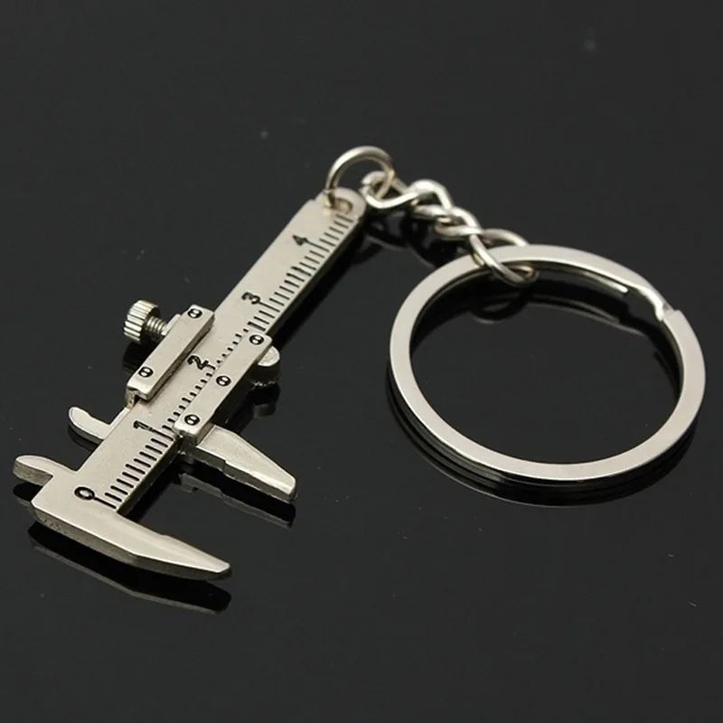 Metal Keychain with Car Wheel Design, Multi-Function Bottle Opener and Mini Vernier Caliper Pendant, Automotive Styling Accessory